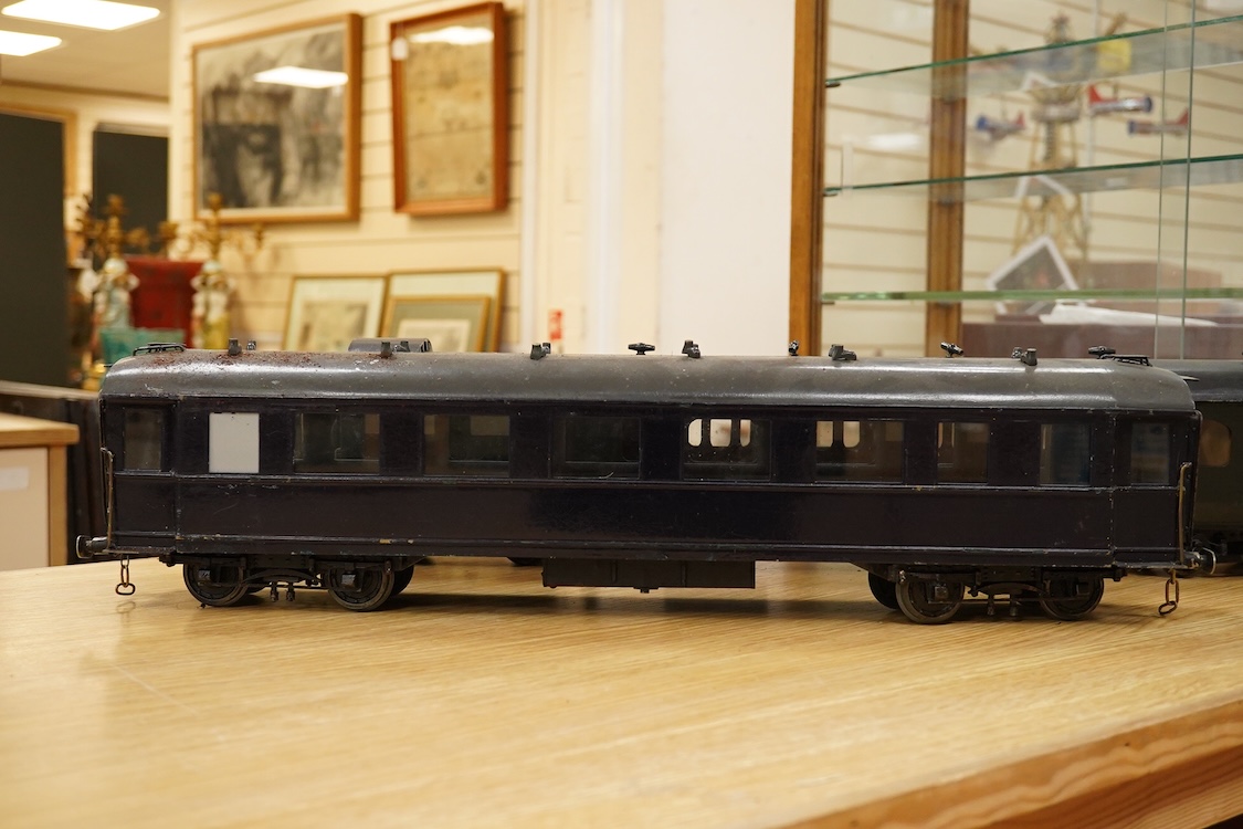 Four Gauge One Continental bogie coaches; two in very dark Green livery, and two ‘Trains Rapides Nord’ in dark green, including some scratch building and possible adaptation from kits